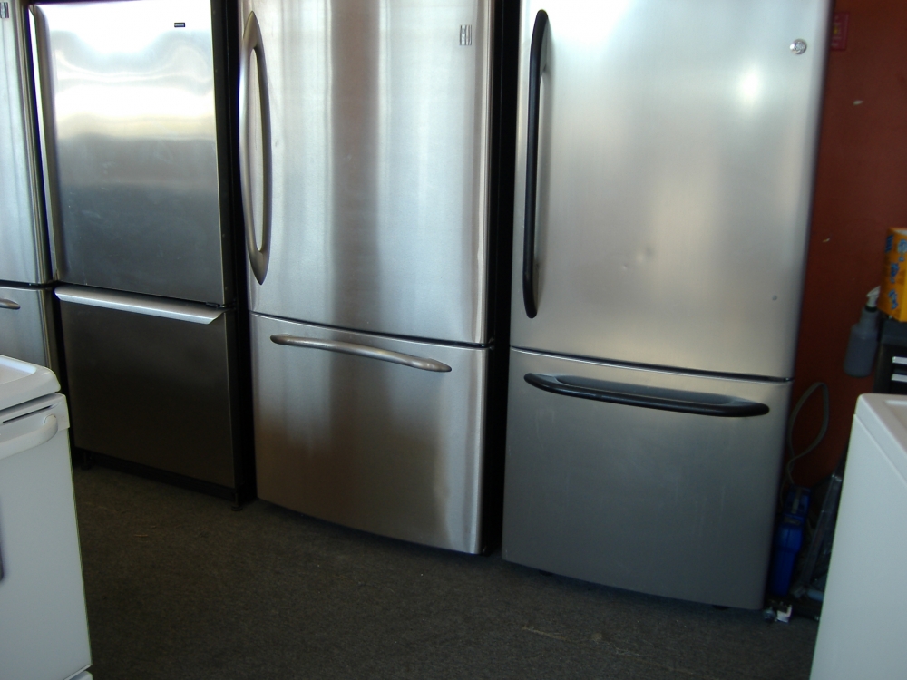 A collection of stainless steel refrigerators for sale