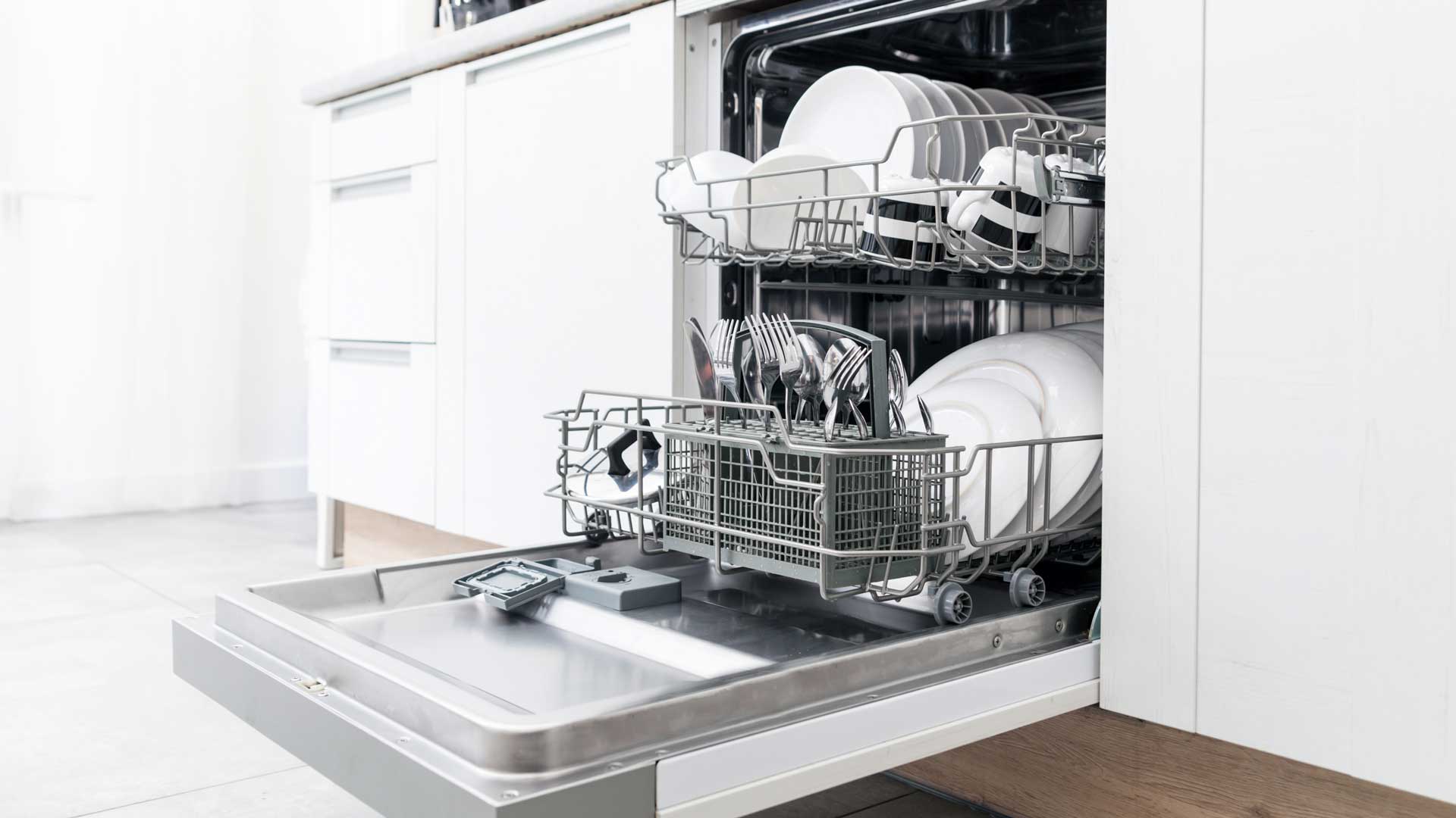 A dishwasher, full of clean dishes